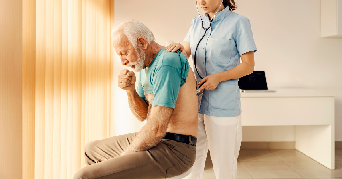 Older man getting checked out by nurse