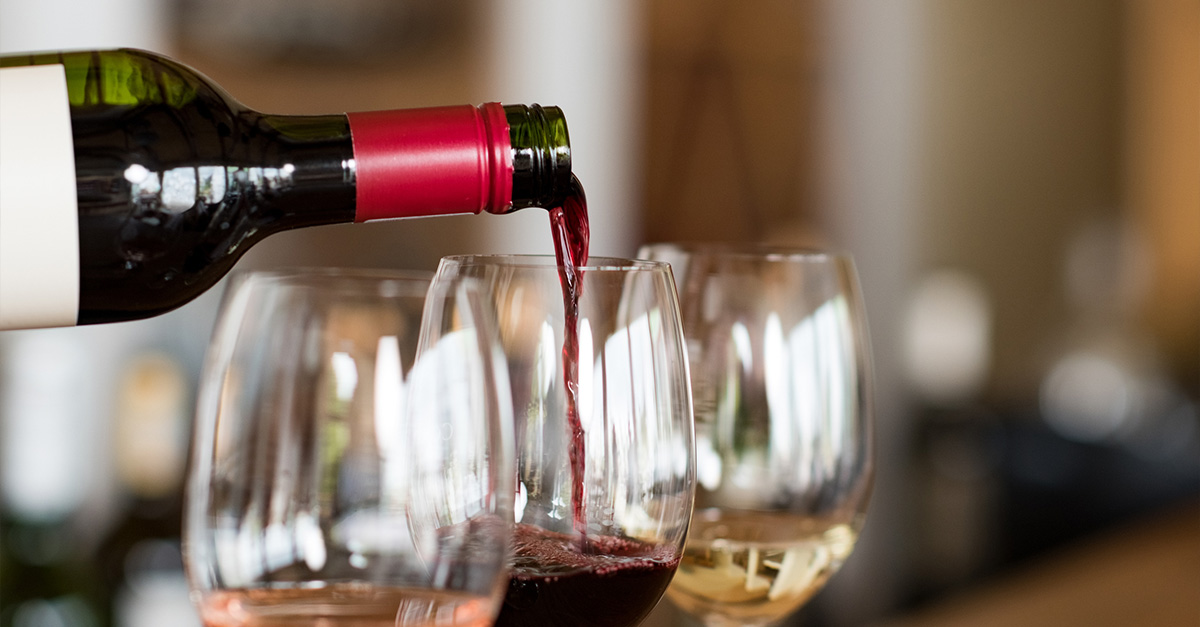 Wine being poured into a wine glass.